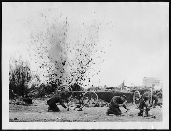 Cyclists sheltering from shelling, Western Front, during World War I, circa 1918