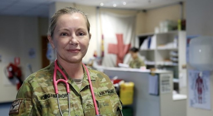 Woman in Australian defence fatigues with stethescope around neck