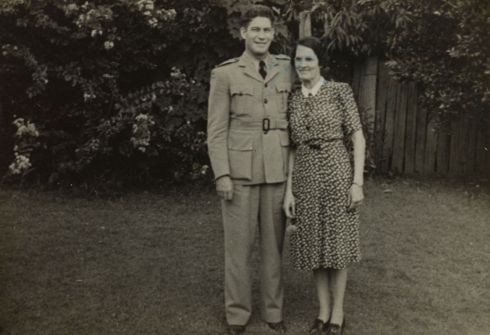 Ernest Duncan in his RAAF uniform standing with a woman