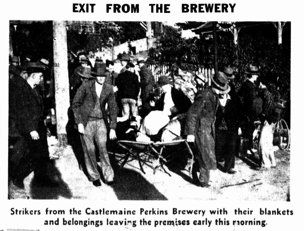 Black and white newspaper image of a collection of men in coats and hats pulling bundles of clothes on stretchers. The headline above the image reads: 'EXIT FROM THE BREWERY' and the caption below the image reads: 'Strikers from the Castlemaine Perkins Brewery with their blankets and belongings leaving the premises early this morning.'