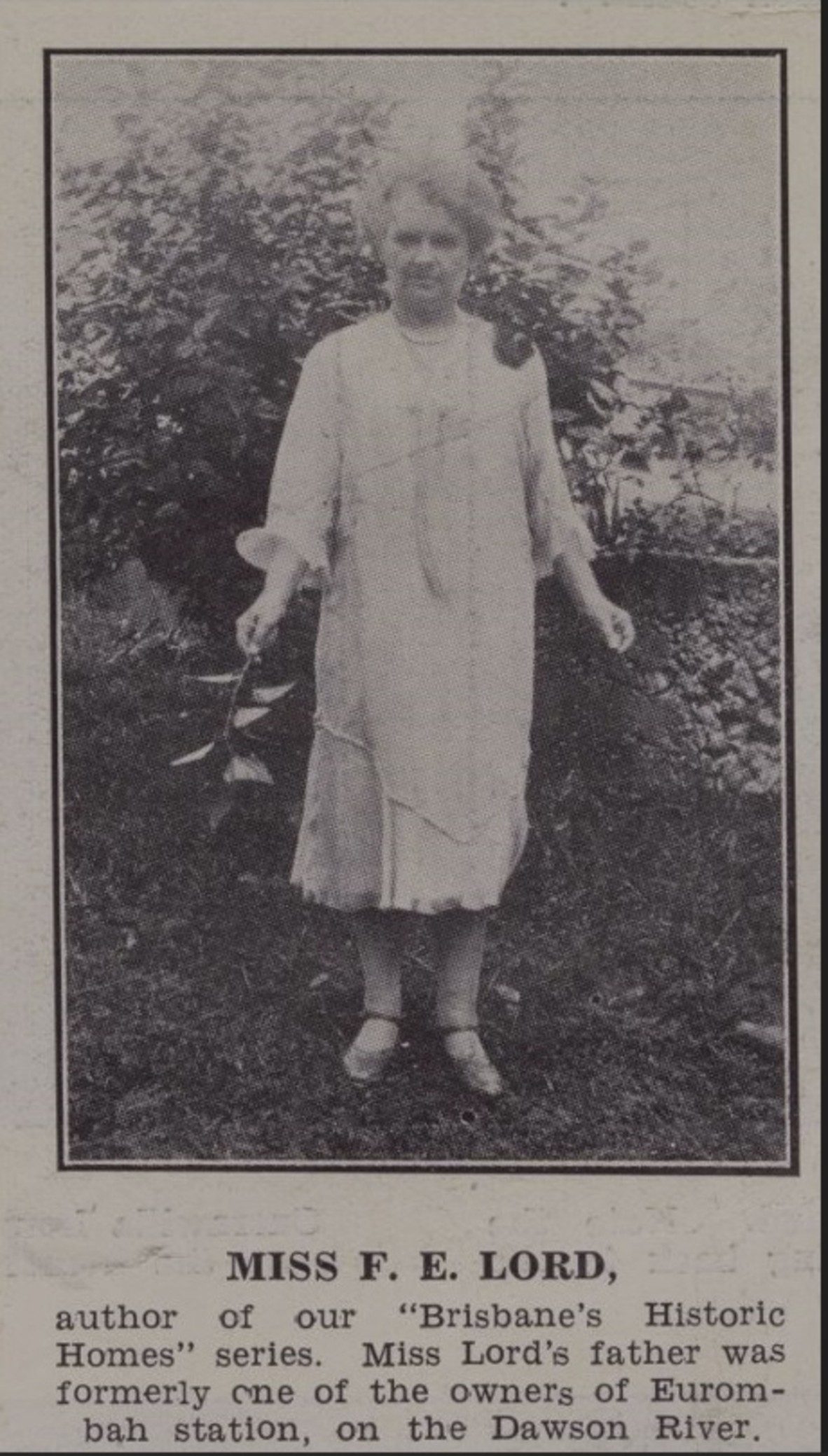 Miss F. E. Lord standing in the garden