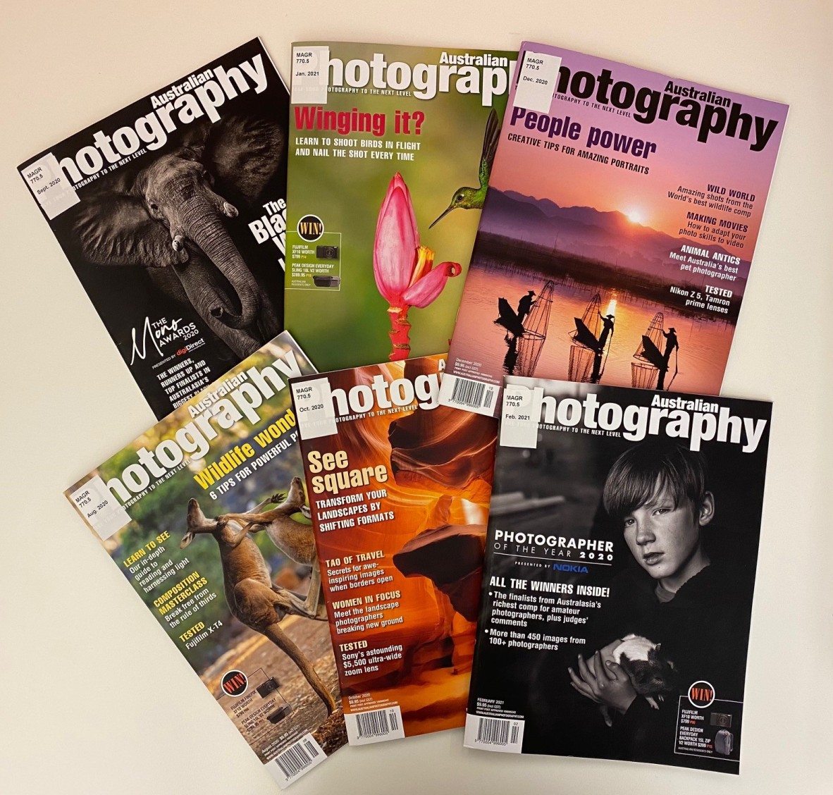 Photo of six magazine covers, all 2020 and 2021 issues of Australian Photography magazine