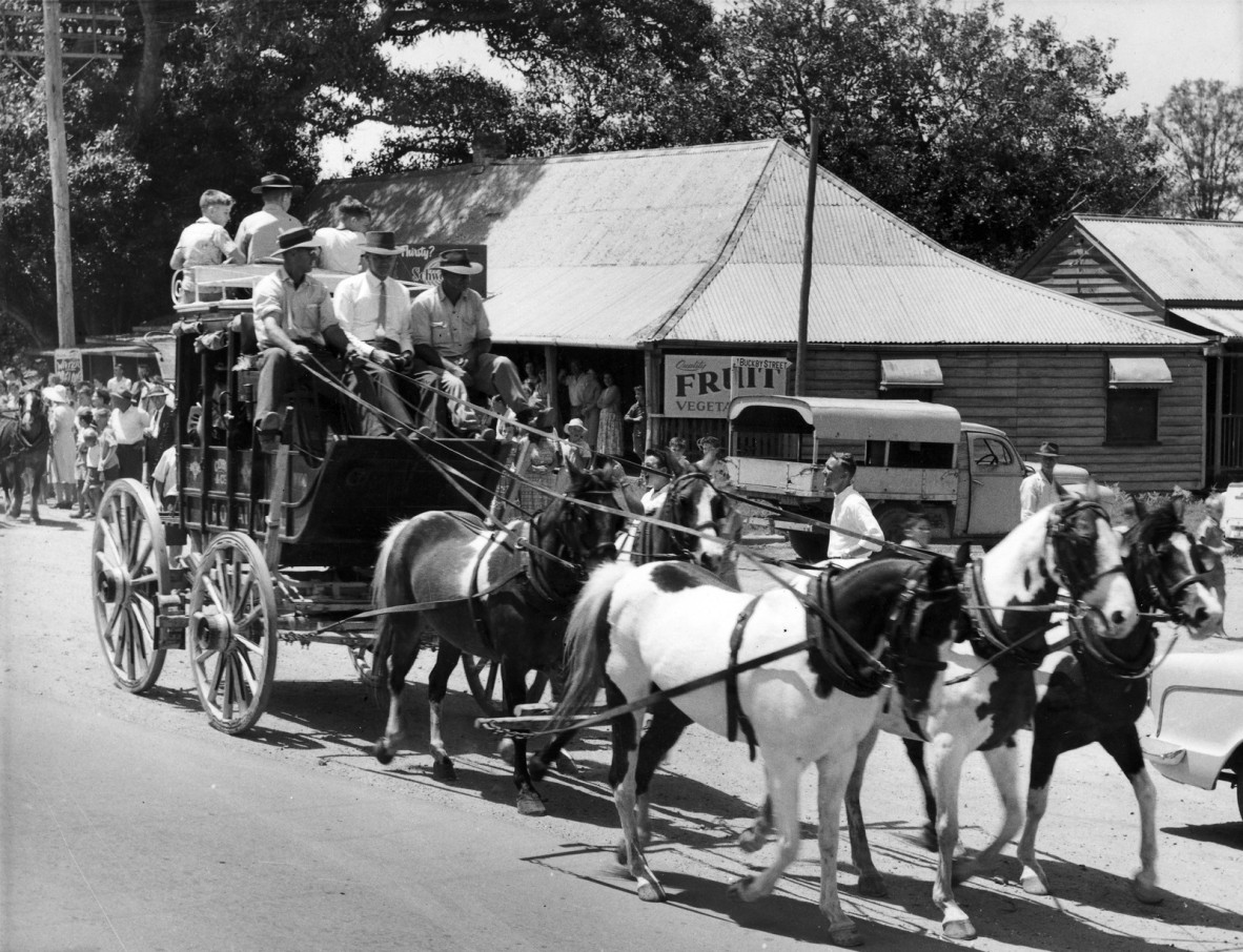 Replica Cobb  Co coach with a load of passengers departing the original coaching station at Strathpine for Bald Hills 7 November 1959
