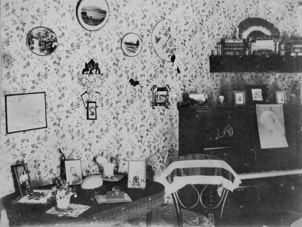 Wallpaper is prominent in this drawing room, ca. 1888.