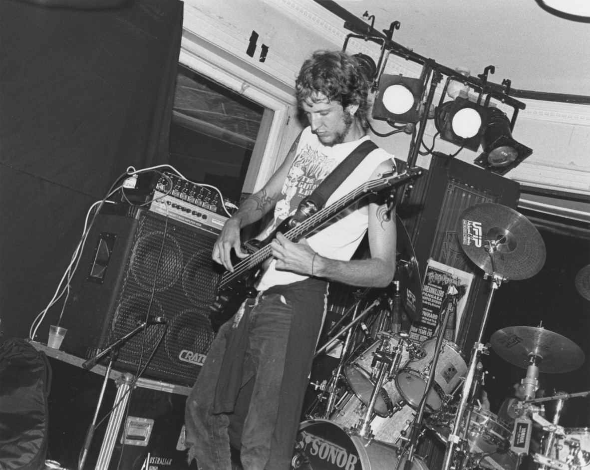 Ben Ely of Pangaea plays his bass guitar while performing at the Hotel Orient