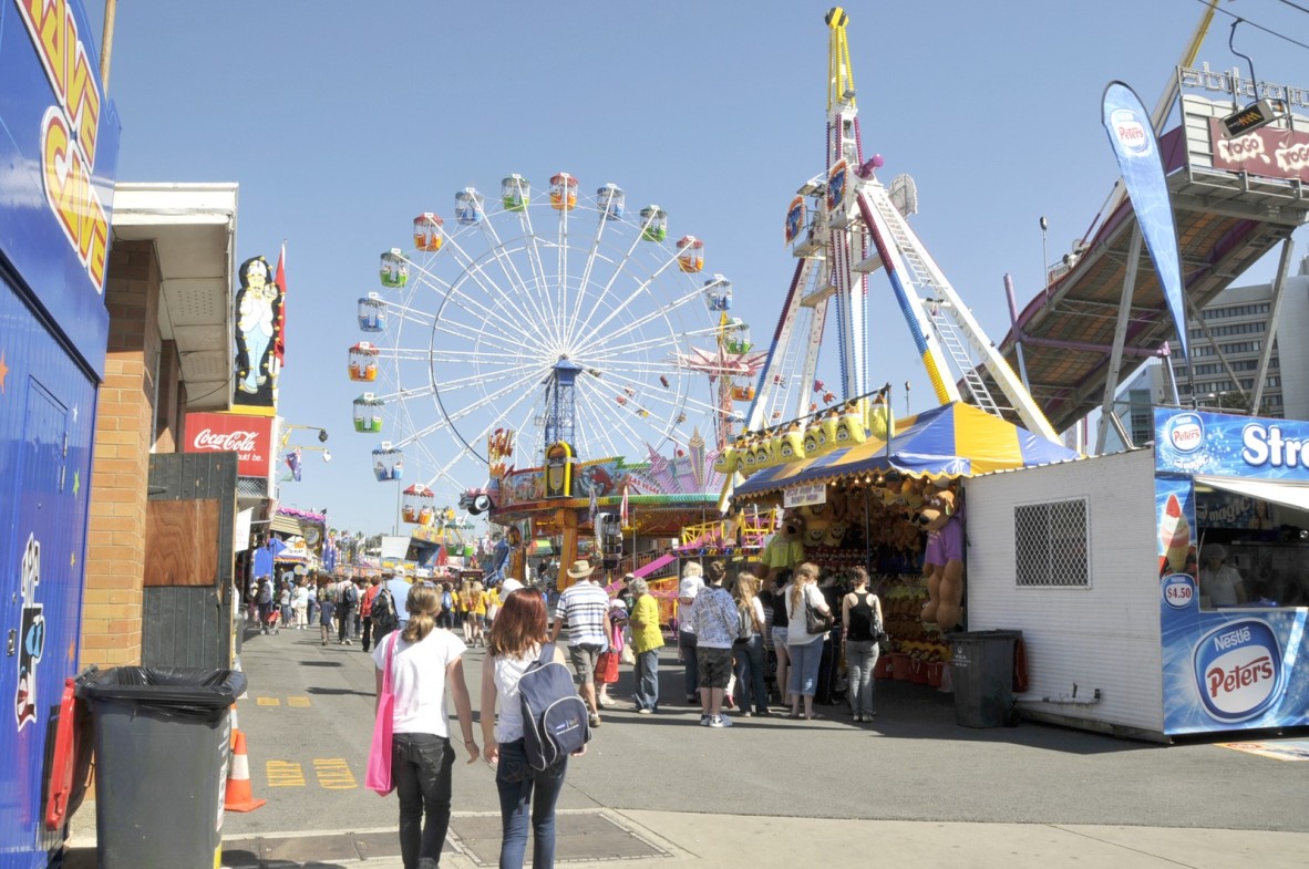 Sideshow alley featuring the Ferris wheel Ekka 2009