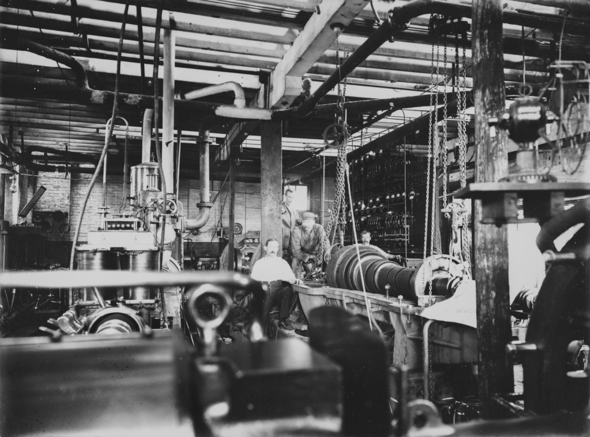 Workshop interior at one of Barton, White and Co.s power stations in Brisbane, Queensland, ca. 1900.