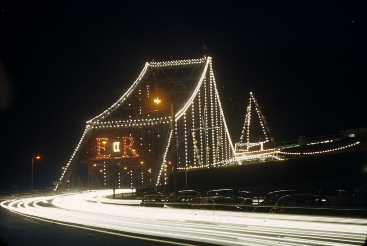 Night time photograph of Brisbane's Story Bridge decorated with lights