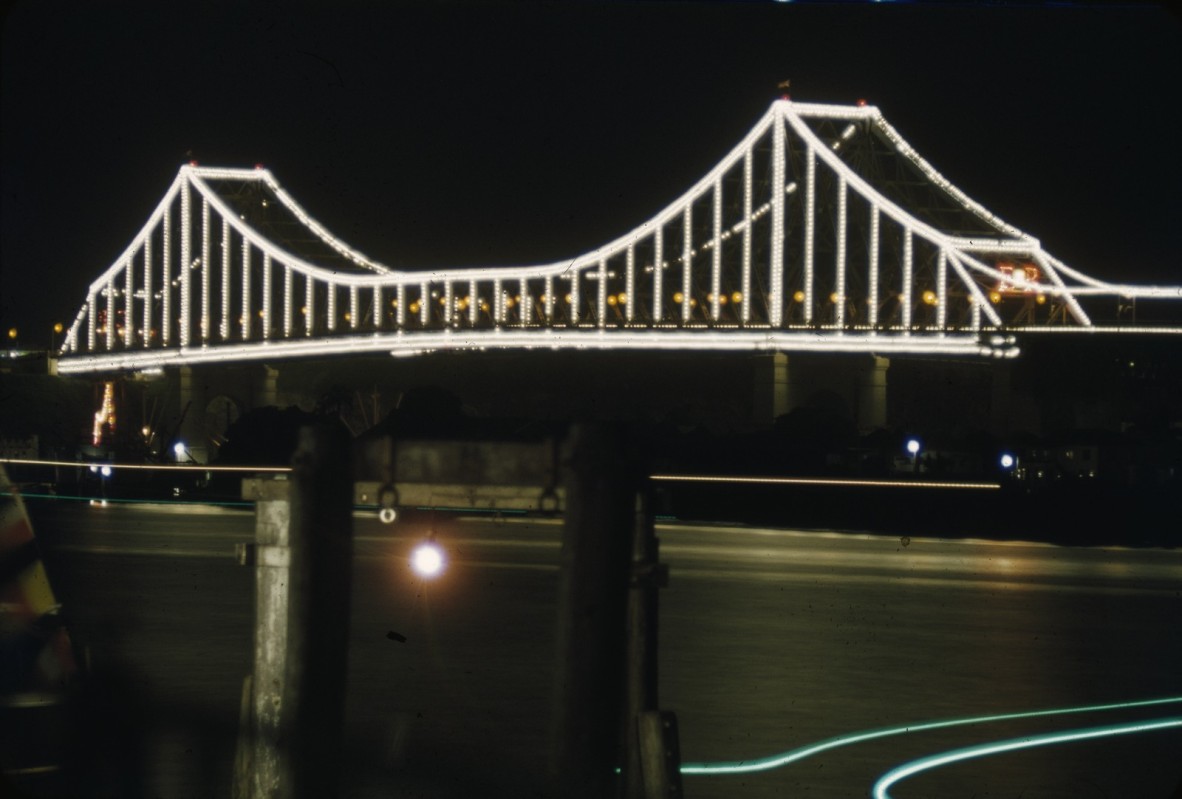 Colour photograph of the Story Bridge covered in lights