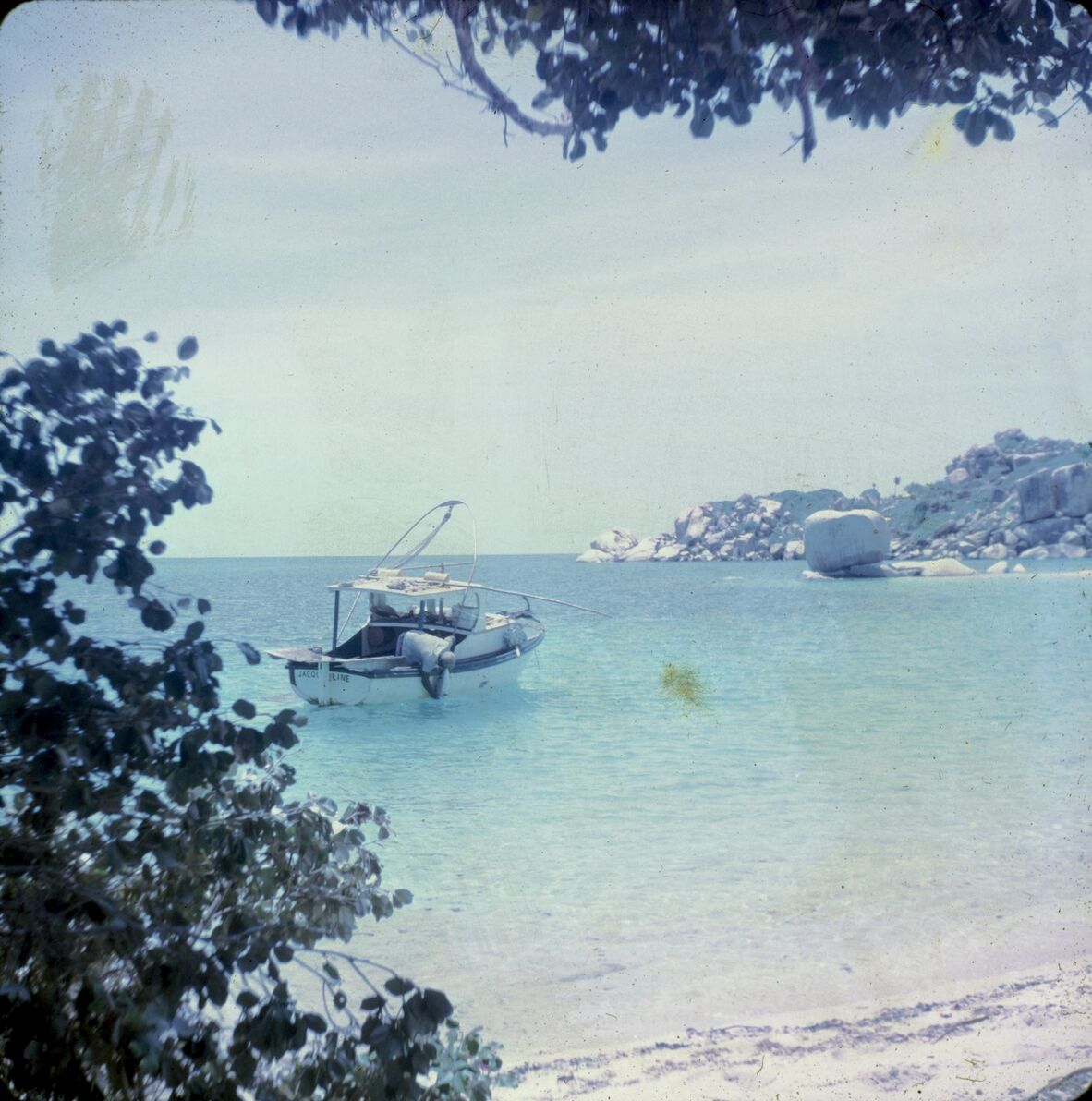 Man fishing in his boat off the coast of Hawkesbury Island (Warral Island)