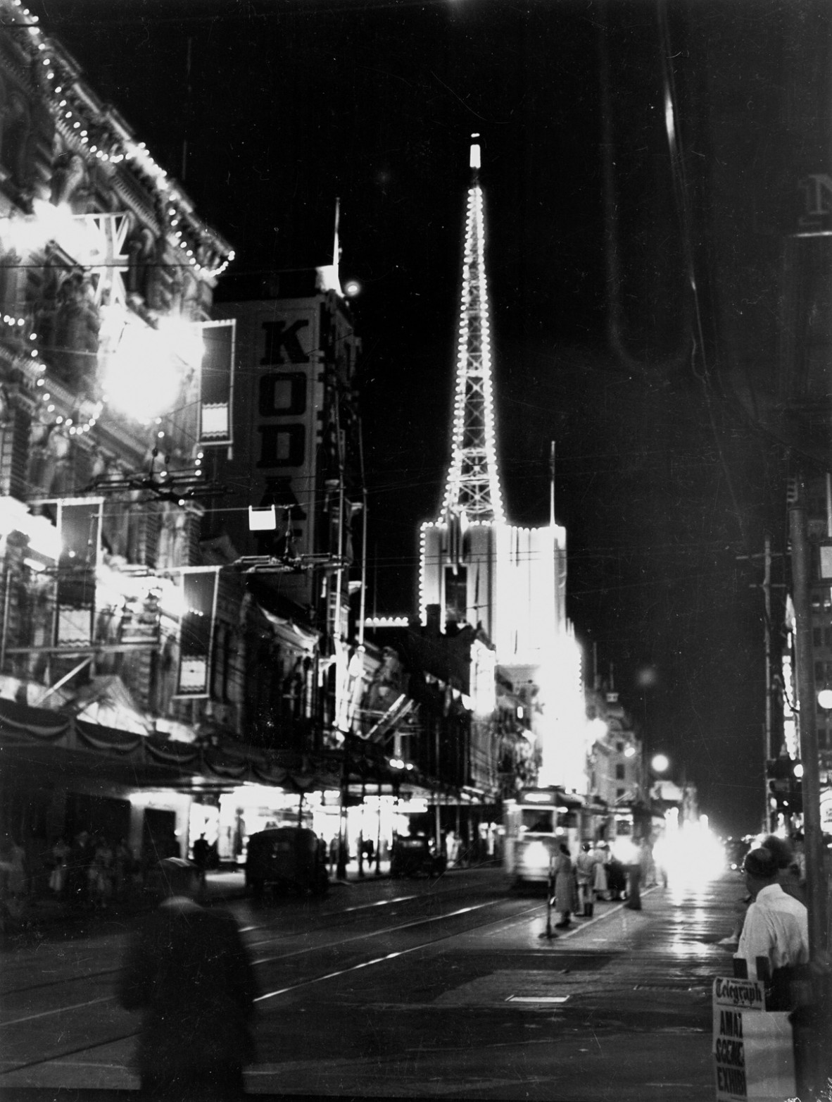 Illuminated buildings in Queen Street, Brisbane, 1954