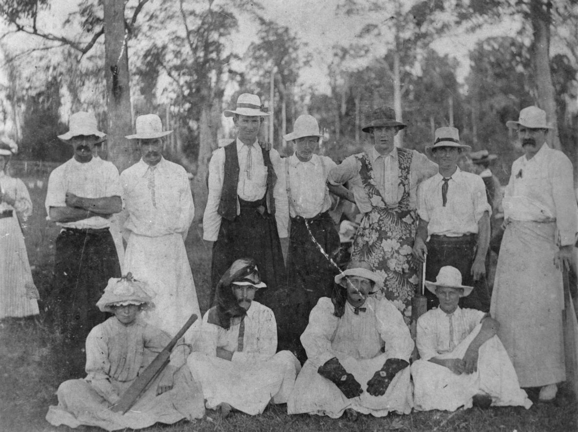 Men dressed in women's clothes at a picnic cricket match, Yandina, ca. 1907