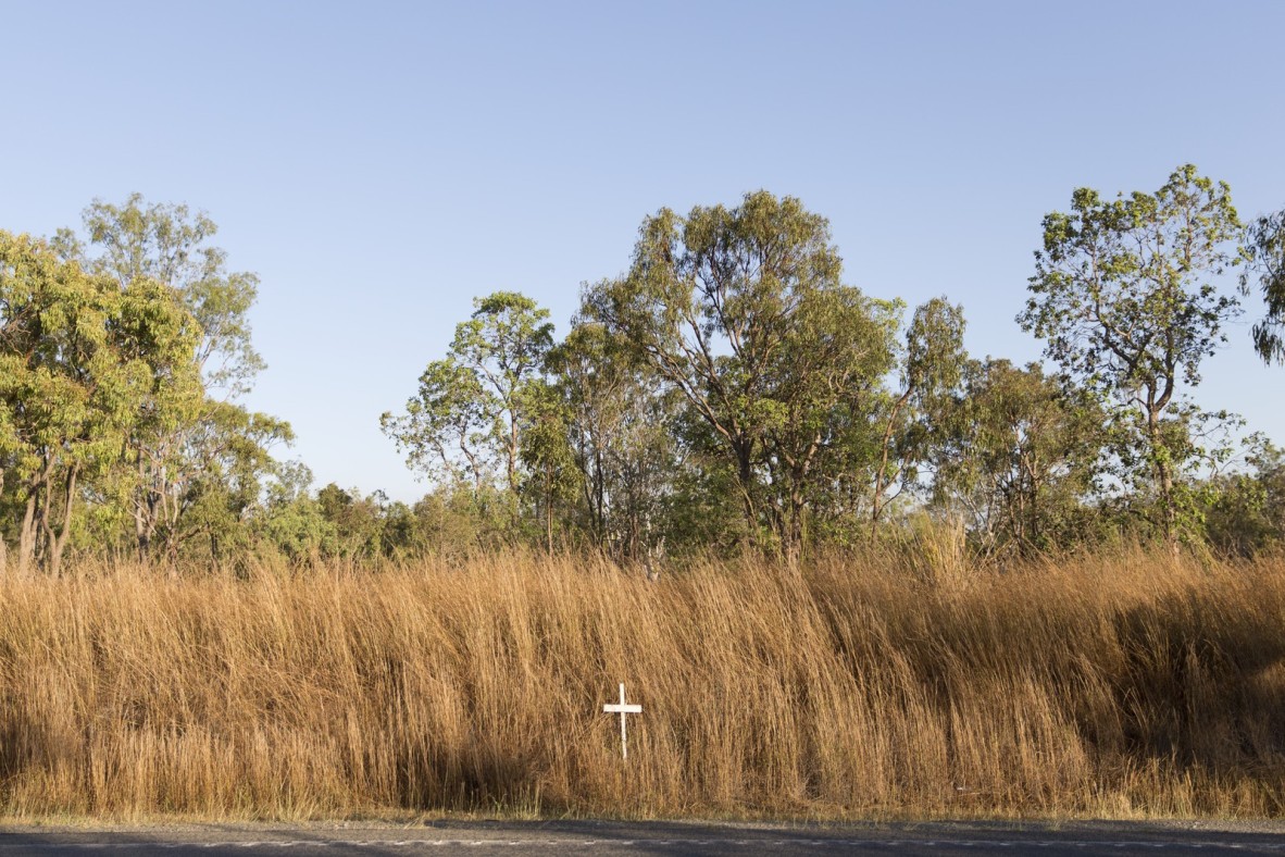 Small white cross on the side of the road near Moranbah, 2013.