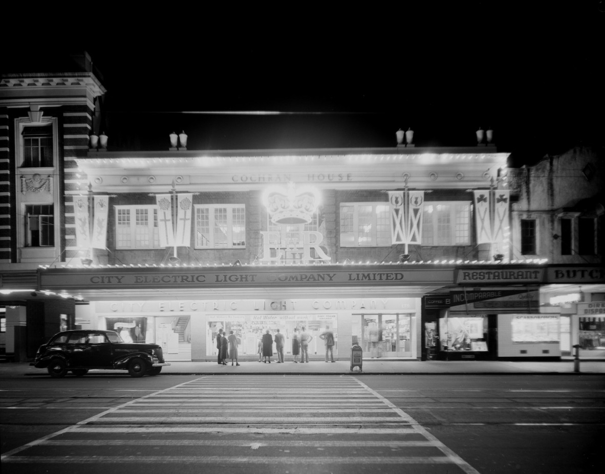 Night view of Cochran House, the home of the City Electric Light Company Limited, in Adelaide Street, Brisbane