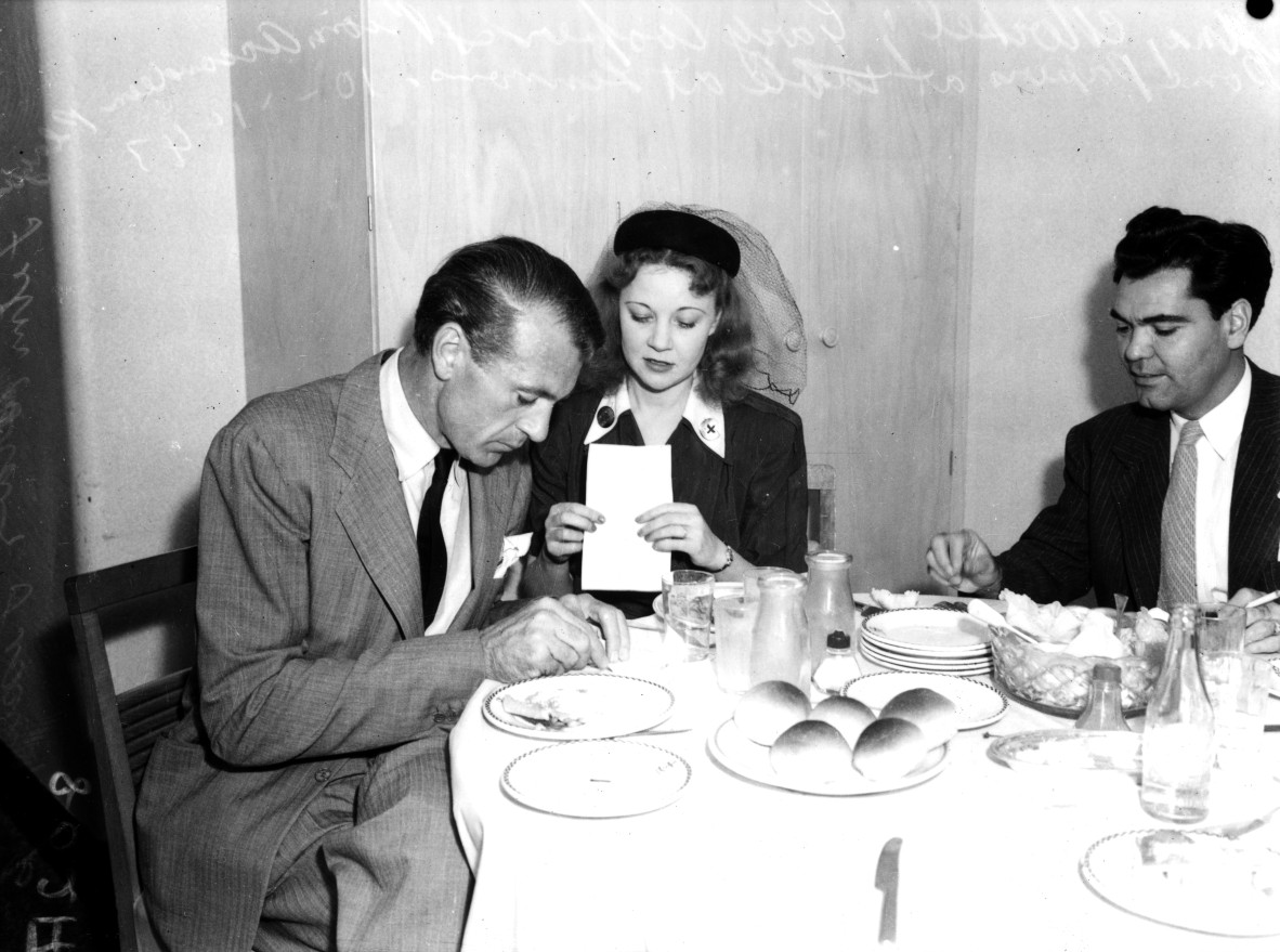 Film stars Gary Cooper and Una Merkel lunching in a private suite at Lennon’s Hotel, Brisbane