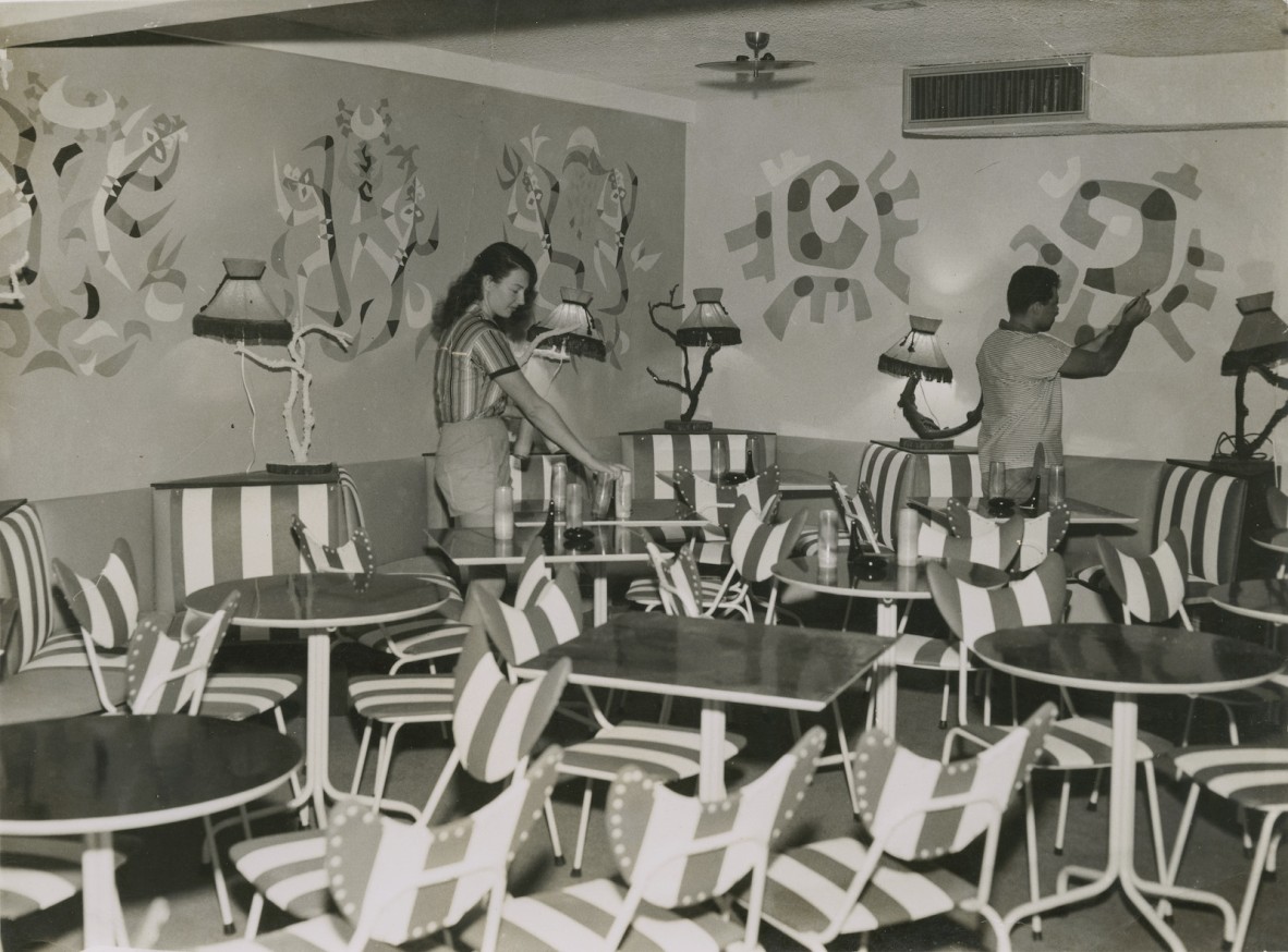 Peter Hackworth and commercial artist Peter Werner decorating the interior of the Primitif Coffee Lounge, Brisbane.