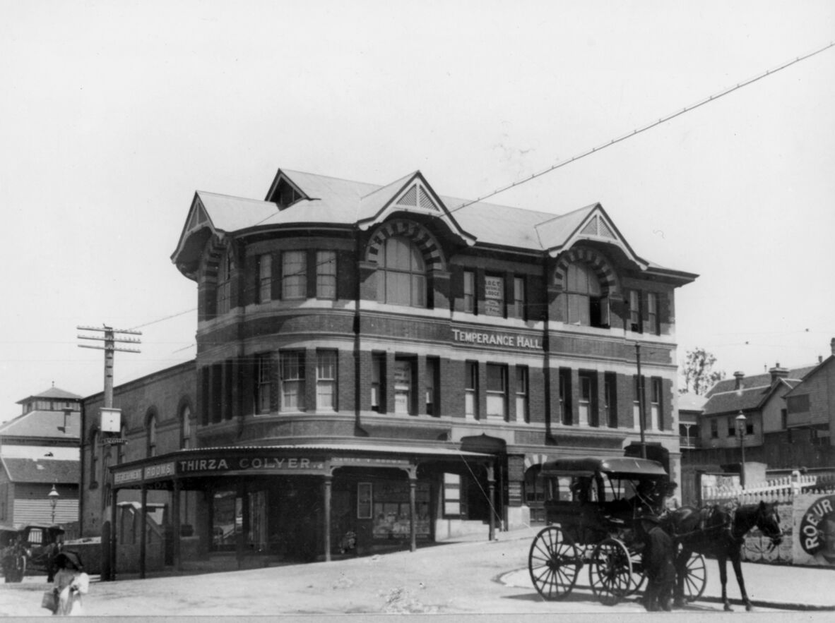 Street view of Temperance Hall and the Colyer Refreshment Rooms building