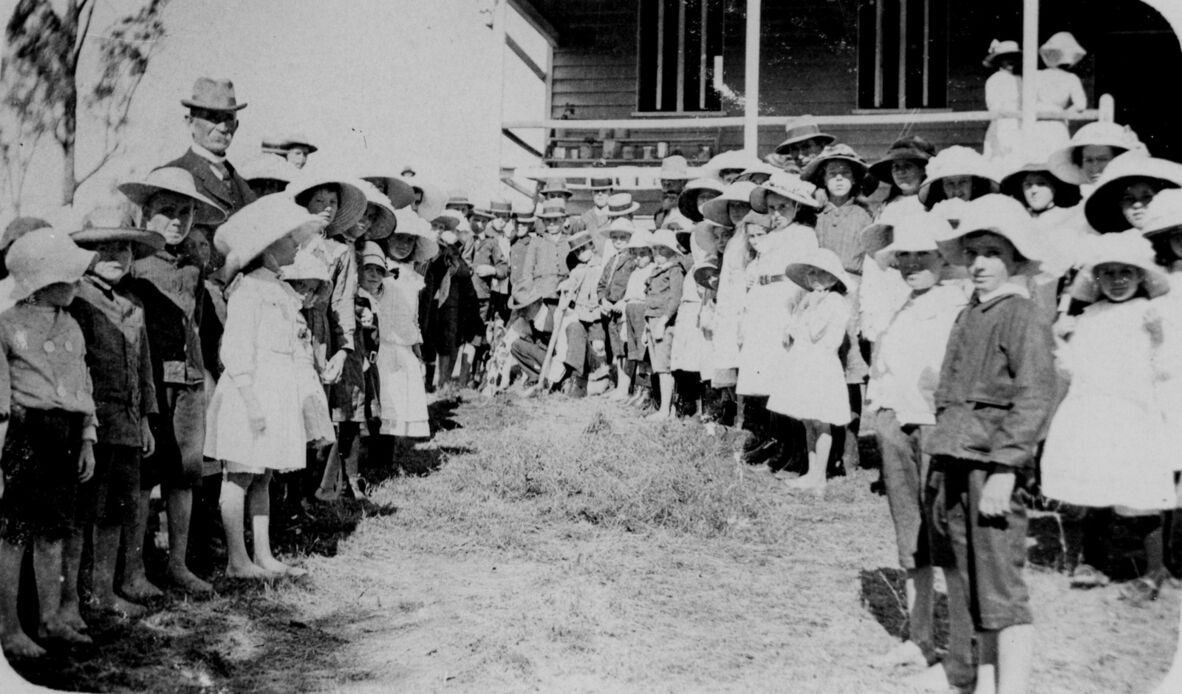 Children assembled for a tree-planting on Arbor Day at Blenheim, Queensland, ca. 1913.