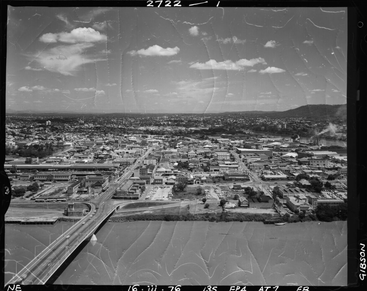 A black and white photo with a view over South Brisbane from the M.L.C. Building, 1976-1982