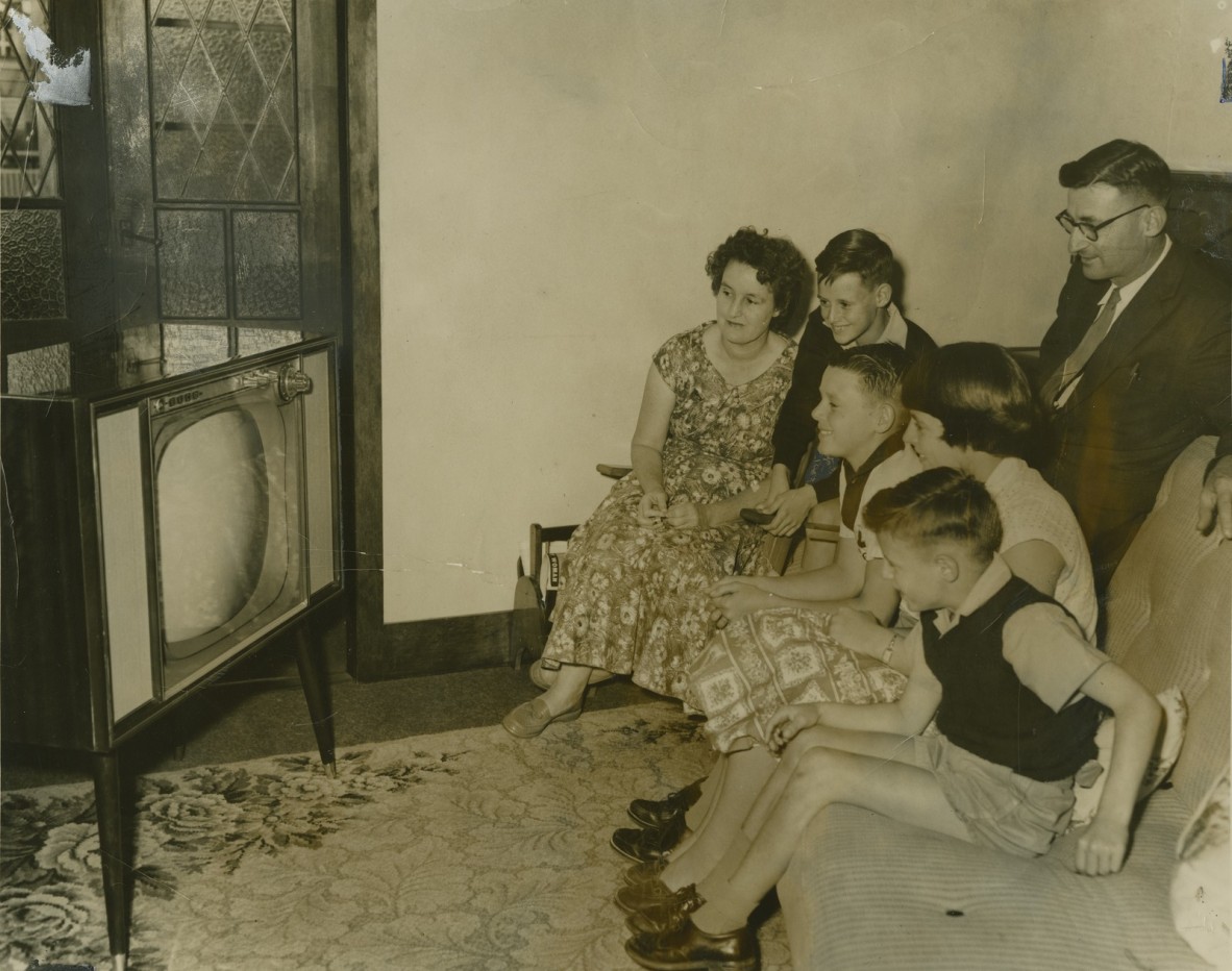 Ginn family gather around to watch television in Brisbane Queensland 1959 In copyright John Oxley Library State Library of Queensland Neg 68711 