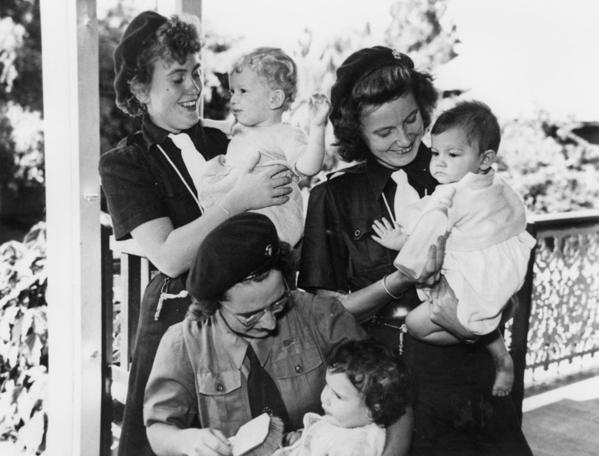 Girl Guides pictured with children from the Lady Cilento Mothercraft Centre, Brisbane, 1950