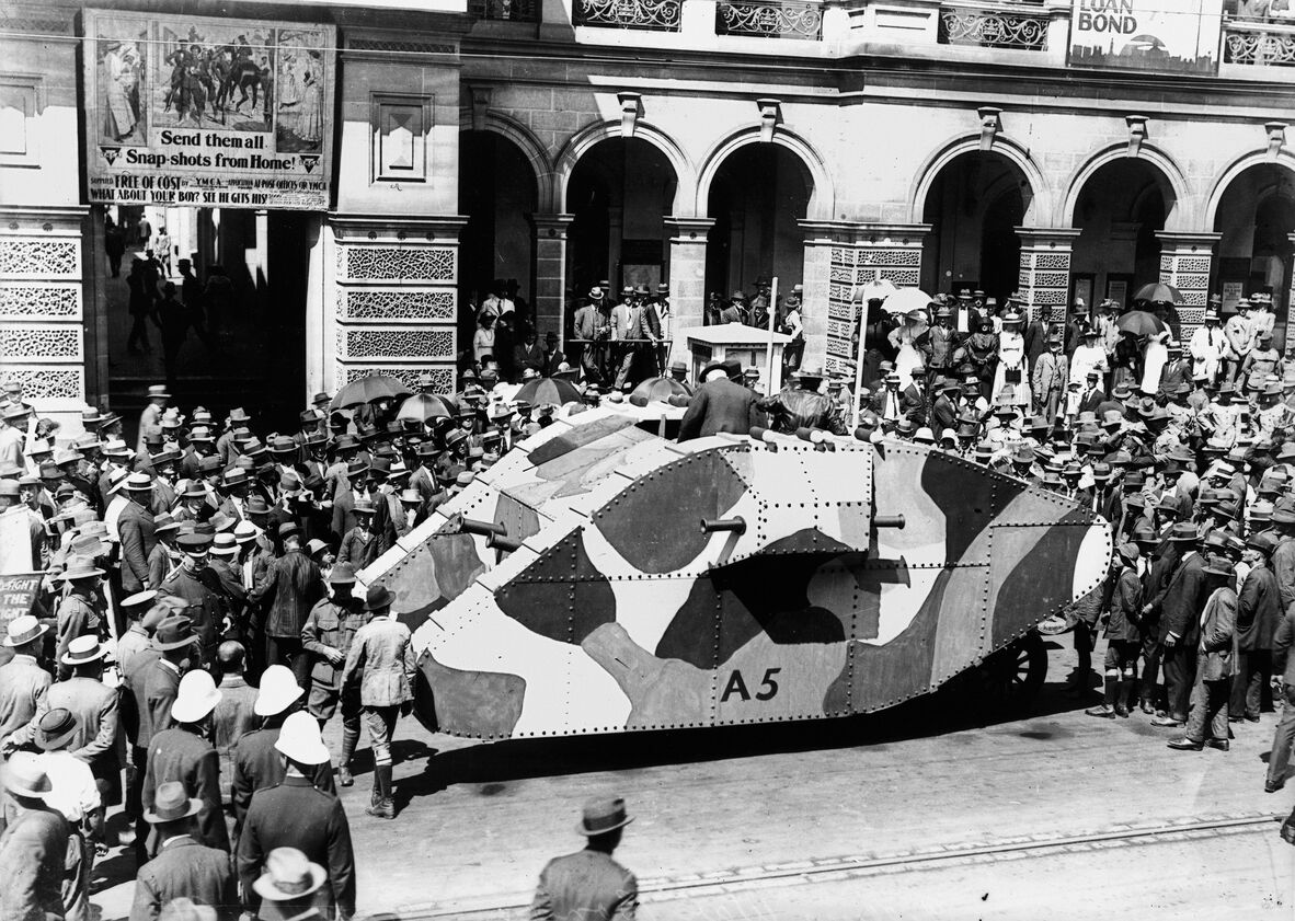 Crowds gather to see a tank outside the General Post Office in Brisbane during World War I.