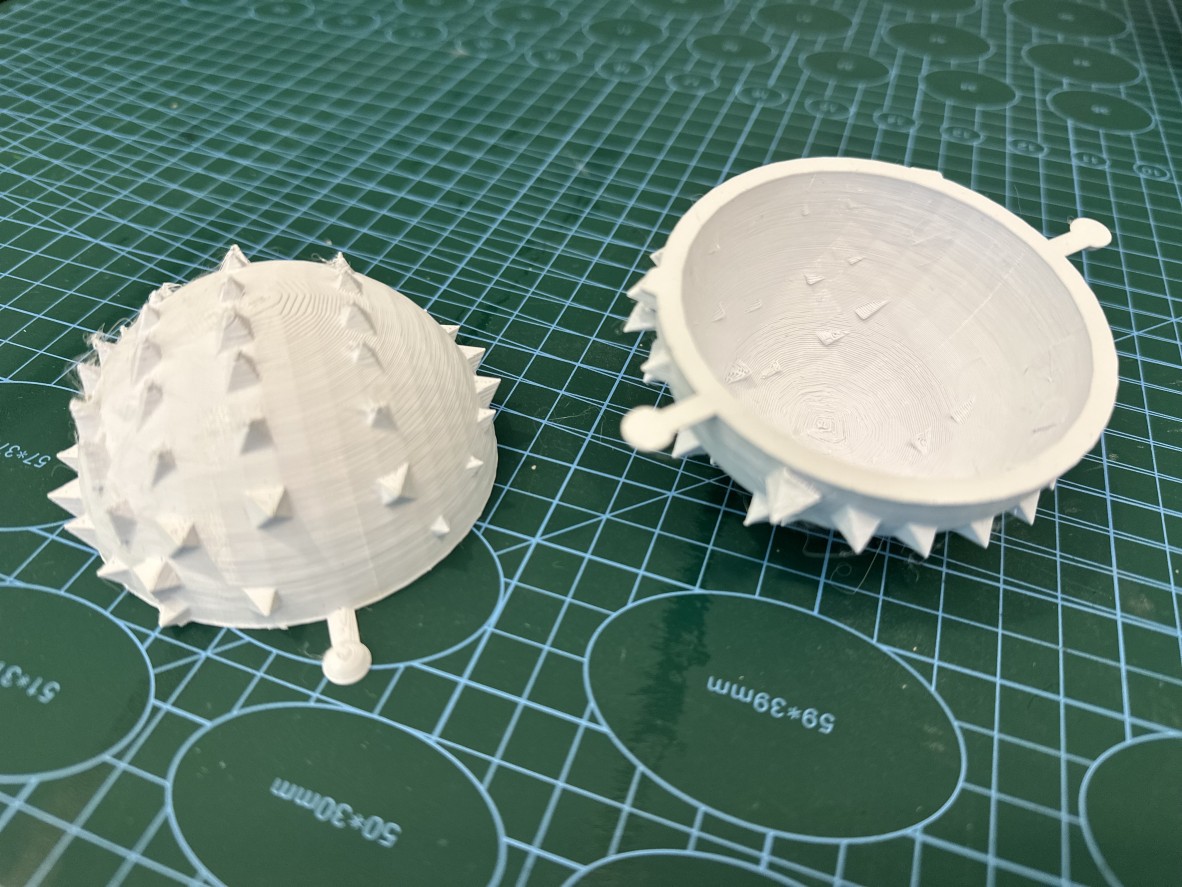 3D printed object that covers tennis balls