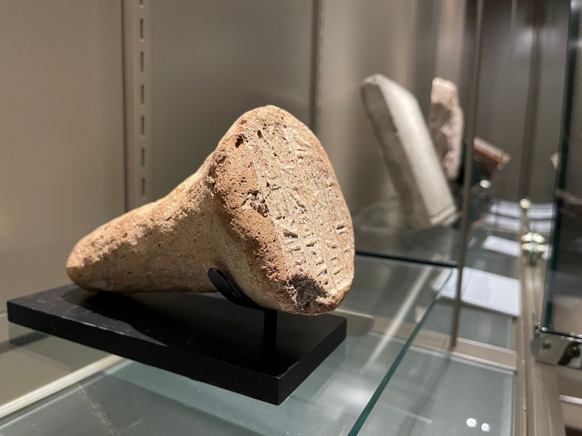 Egyptian funerary cone, 1st century B.C.E., installed in the Australian Library of Art Showcase, 2021. 