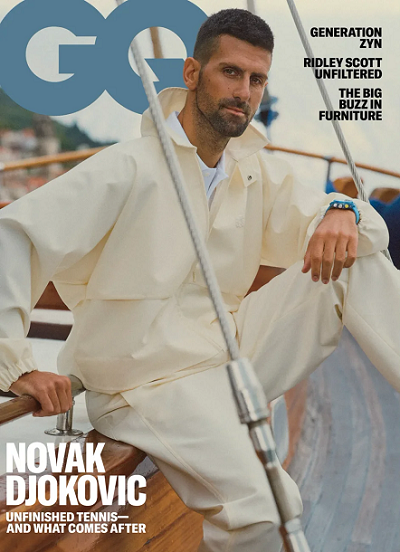 Male sitting on boat on GQ cover