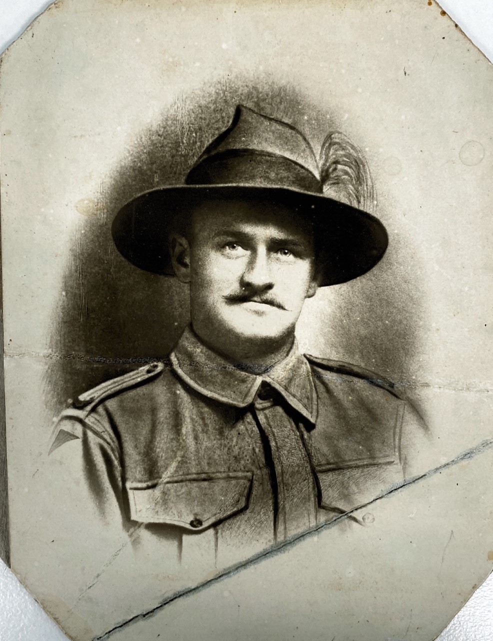 Studio photograph of George Weeks in military uniform, mounted on card.