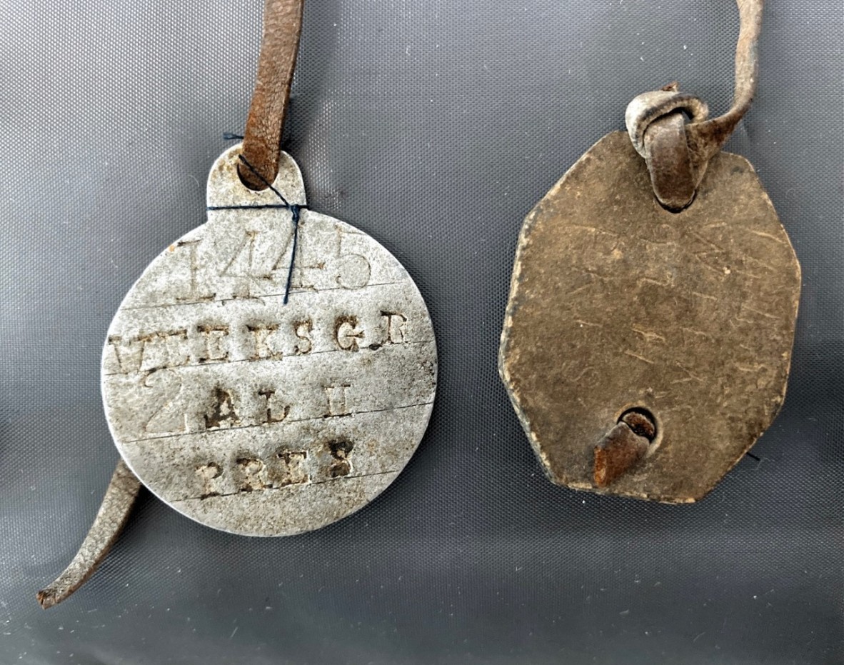 Photograph of George Weeks identification discs returned to his mother Annie Weeks after his death
