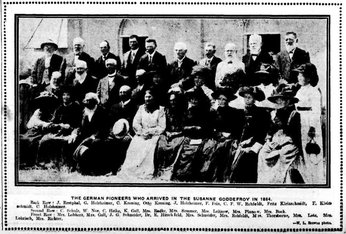 Newspaper photograph with caption of a group of male and female German pioneers who arrived in 1864 published Brisbane Courier 31 January 1914