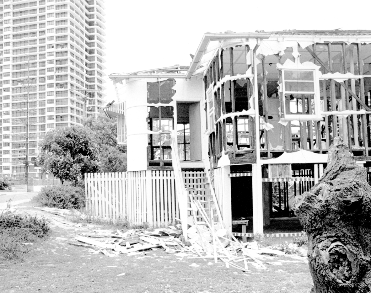 Demolished frame of a house in Surfer Paradise A high-rise appartment block is visible behind ca1970s
