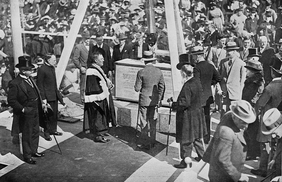 Crowd of people observe the official laying of the Foundation stone for Brisbanes City Hall 1920