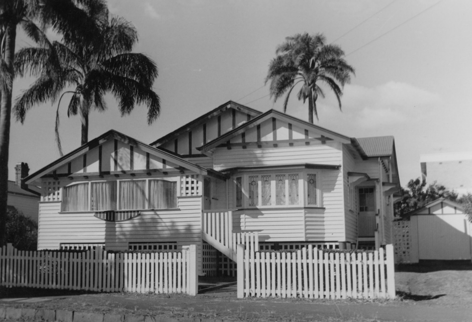 Picture of a mulit gabled house with picket fence at East Toowoomba