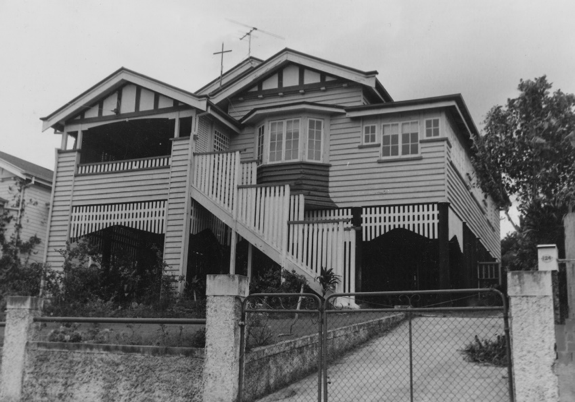 A picture of a multi gable house with staircase in Grange