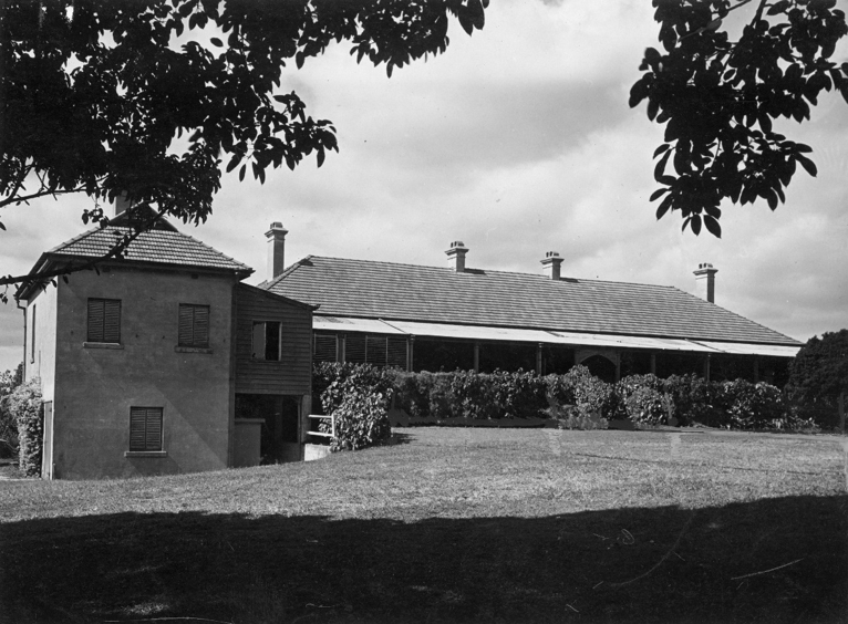 An image of Brisbanes  oldest surviving house in the shade