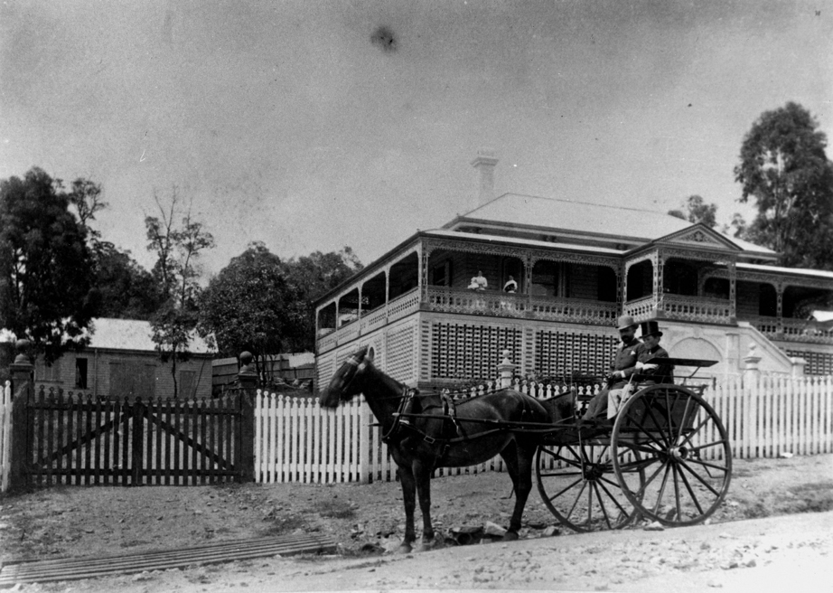 Horse and wagon outside a house in Brisbane
