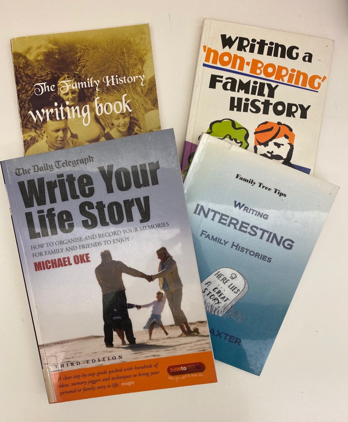 Image of the covers of four books about how to write your family history