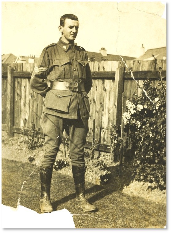 Hugh Campbell in uniform in his backyard 