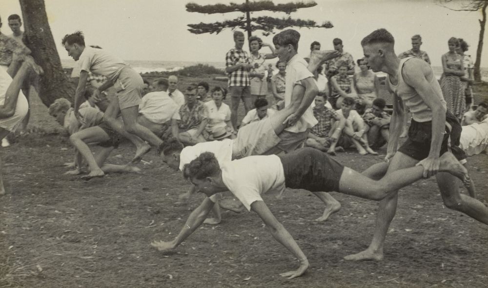 Human wheelbarrow races at Alexandra Park Camp Easter 1956