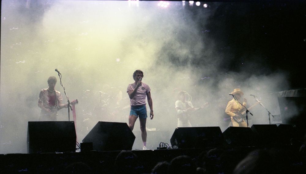 original line up of Skyhooks performing on stage at the Noosa Aussie Hop, 1983