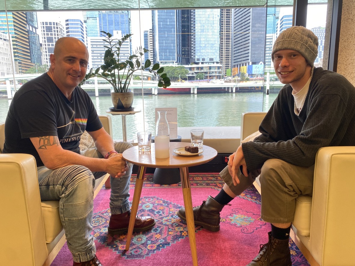 two people sit on lounges at The Edge