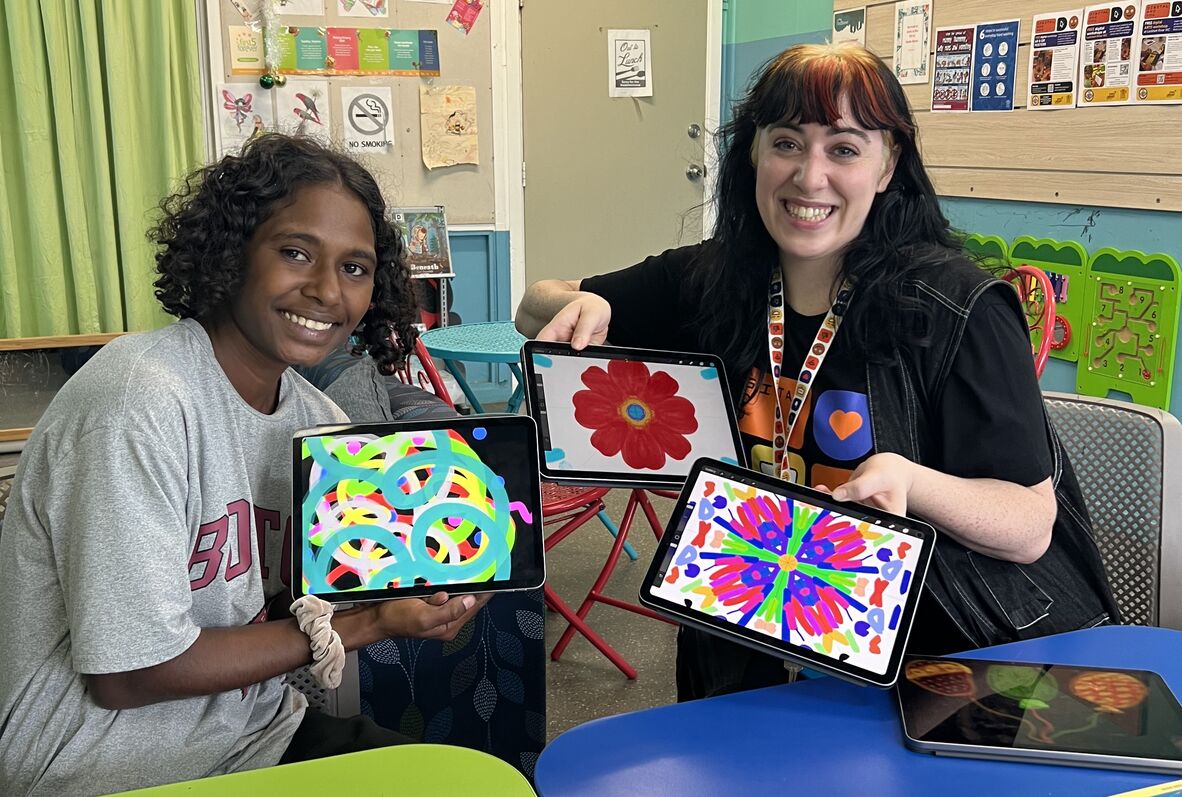3 iPads showcasing student work