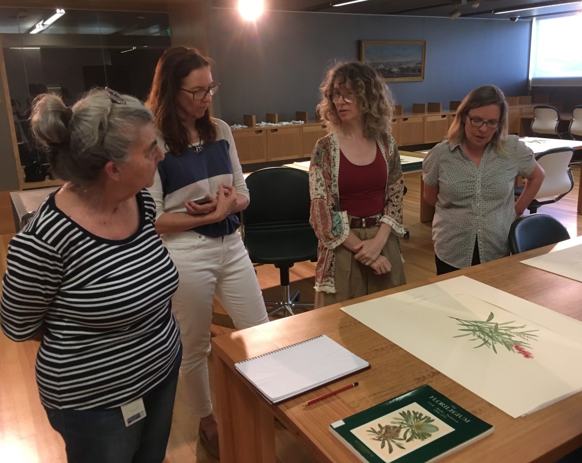 Specialist Librarian Joan Bruce, exhibition co-curator Beth Jackson and artists Florence Joly and Naomi Florence at State Library of Queensland.