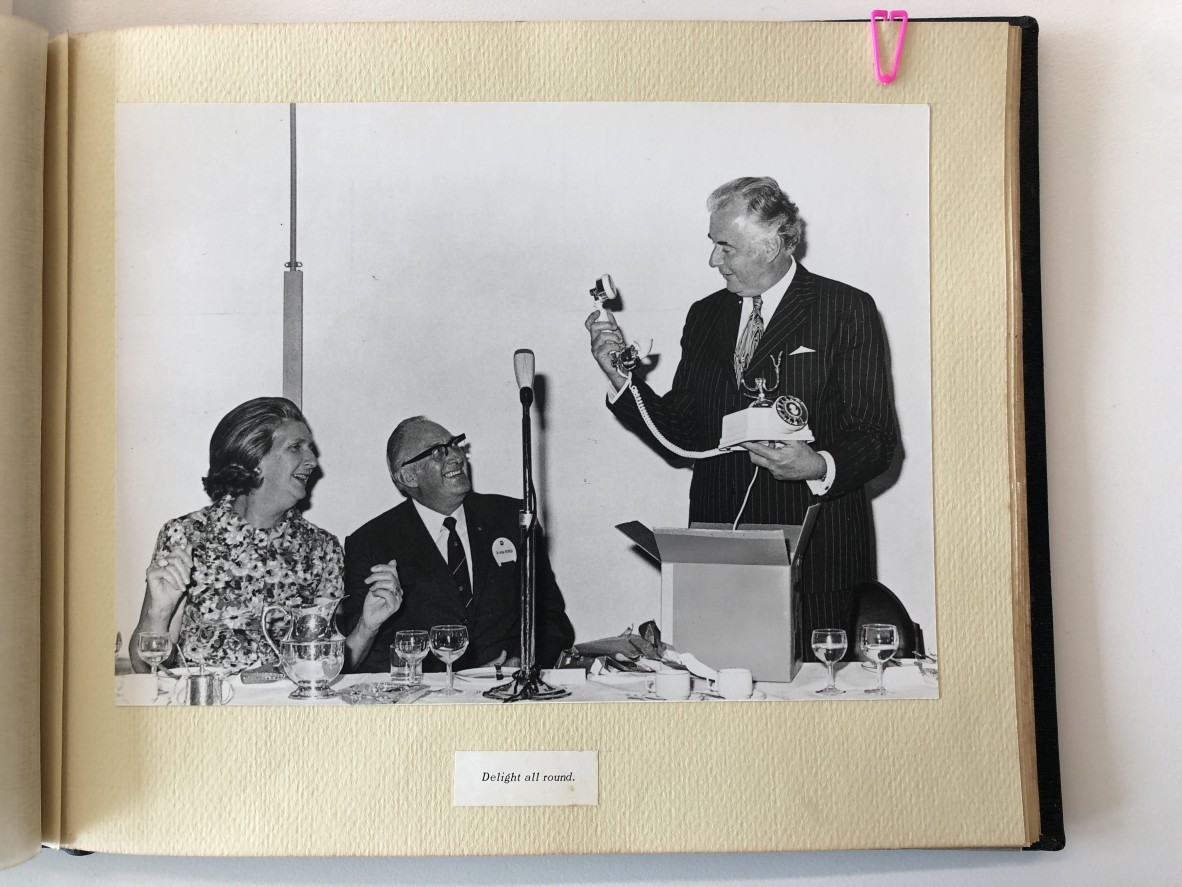 Sir Arthur Petfield presents the then Prime Minister, the Hon EG Whitlam, QC, MP, with an antique telephone at the opening of Broadway Terminal on Thursday, February 21, 1974.