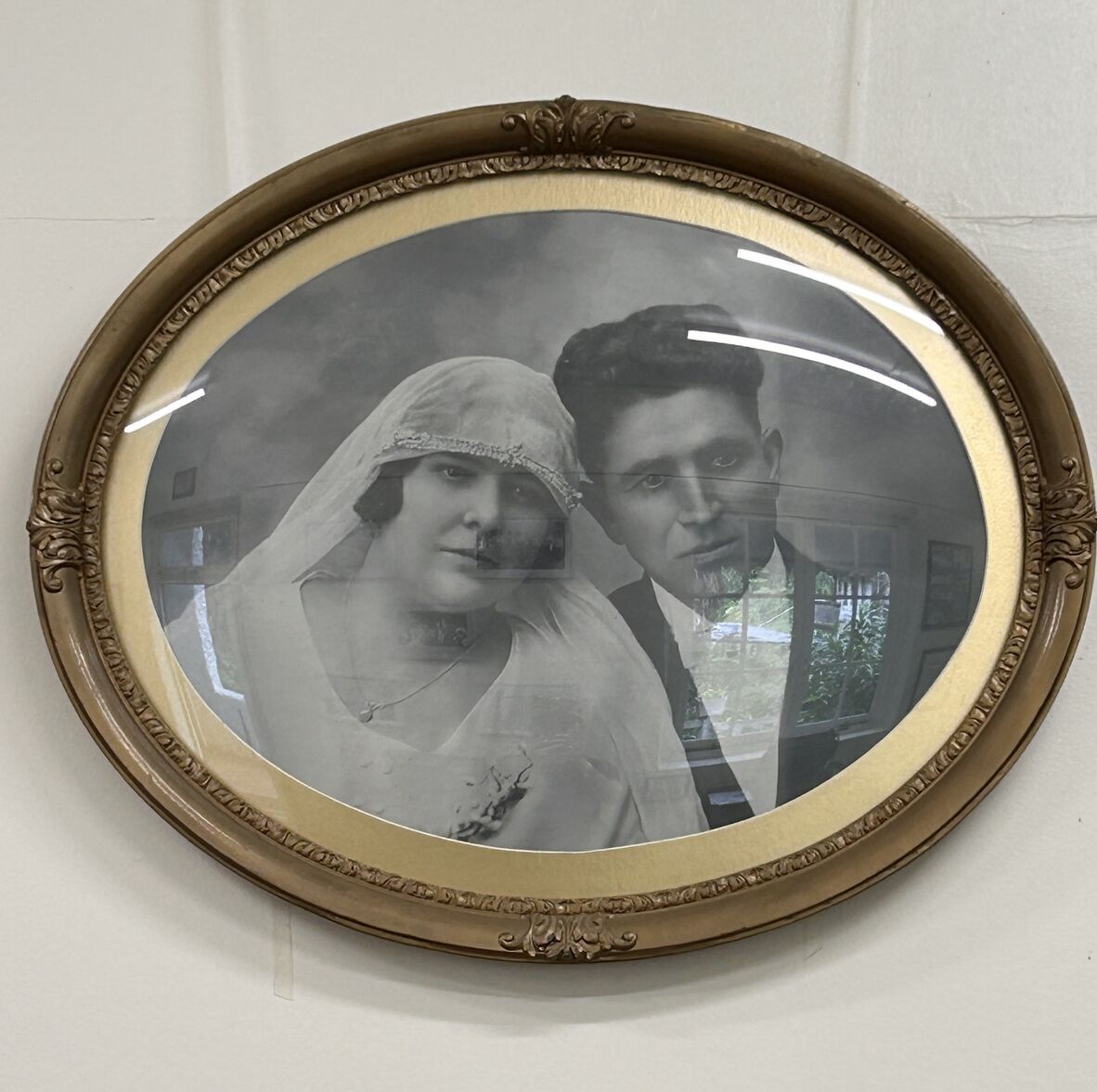 Wedding photo of Margarita and Jose Paronella hanging in the museum, in the old cottage at Paronella Park. 