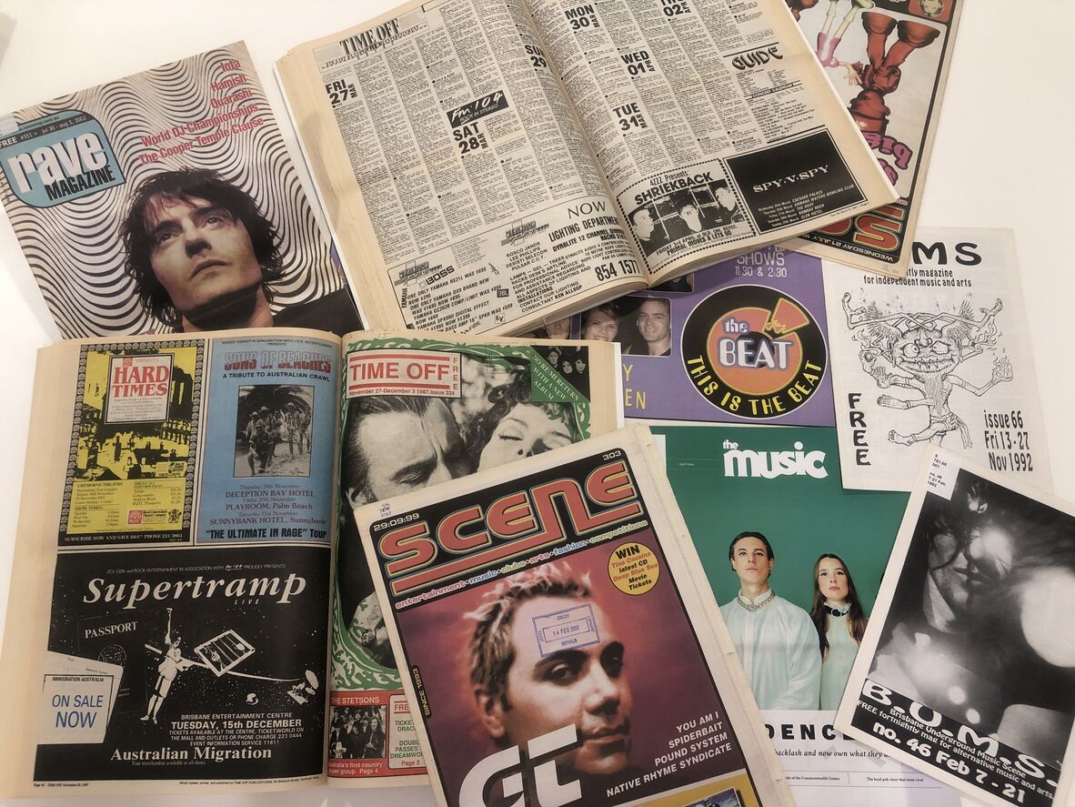 A flat lay of various street publications including Rave, Scene, BUMS, and The Music.