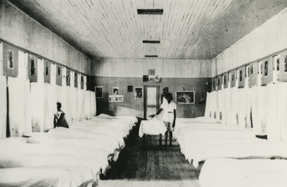Interior of the Girls dormitory Report of the Director of Aboriginal Affairs 1949 Copy Print Collection John Oxley Library State Library of Queensland