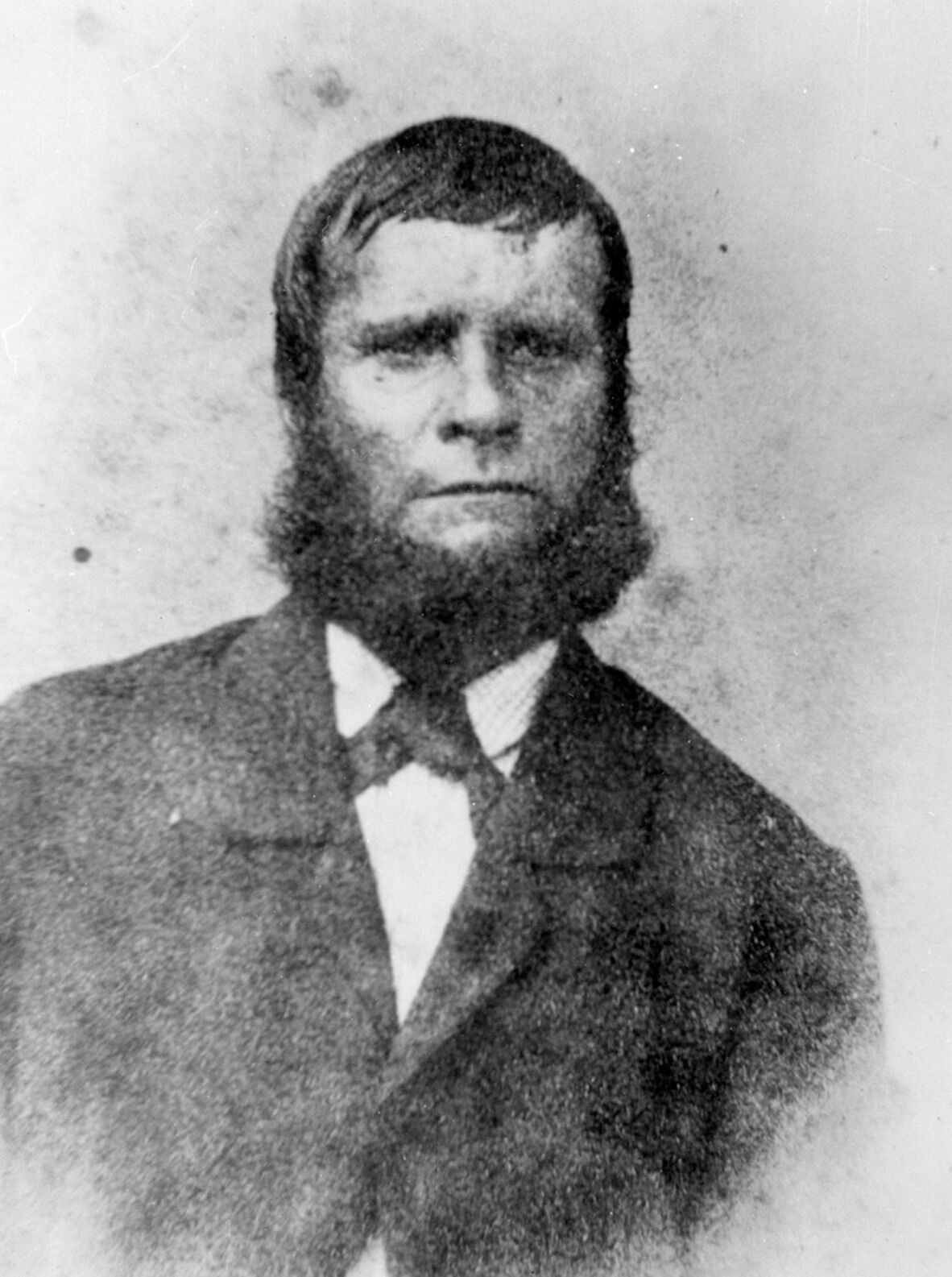 1800s man with chin beard and wearing suit